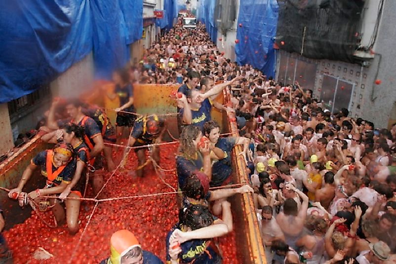 Flocks of young participants throng to Buñol, Spain in August of each year to engage in the tomato-throwing madness.