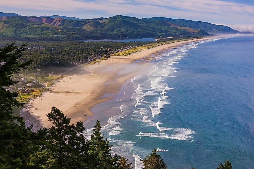 Aerial view of Manzanita Beach with Pacific Ocean surf on the Oregon coast.