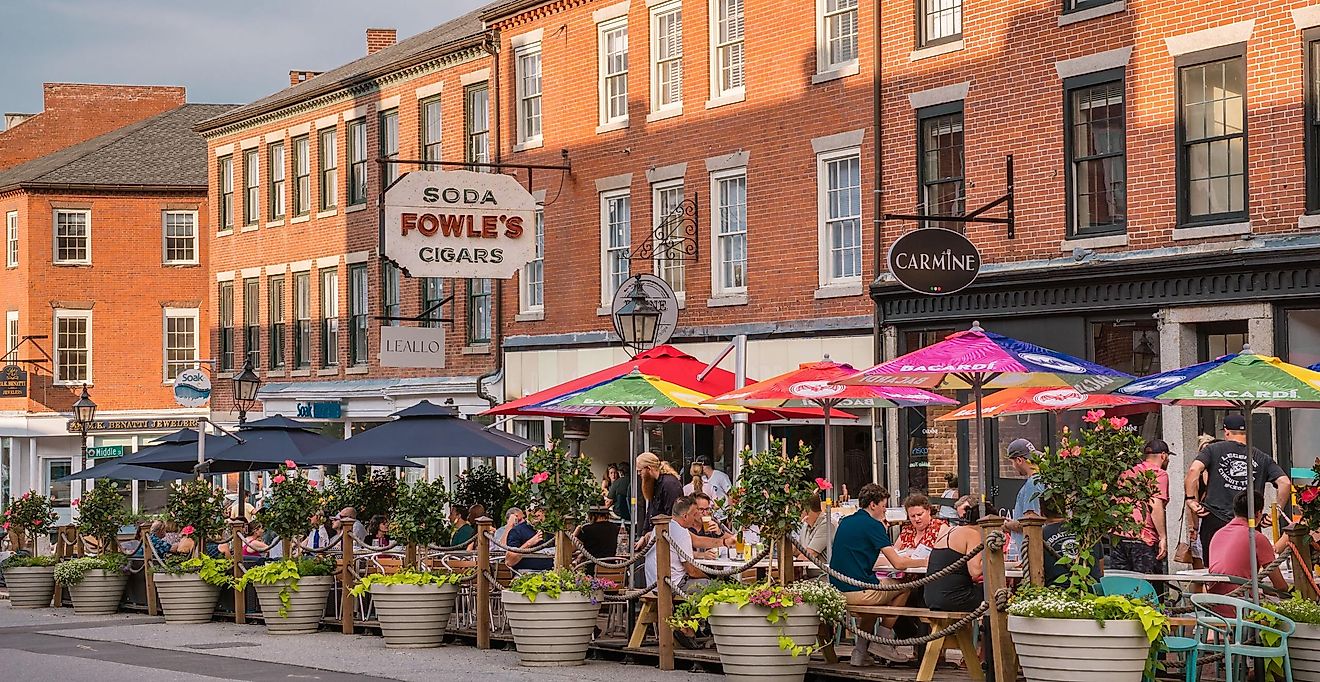 Retro sign in downtown of this small town with its quaint streets with 19th century brick buildings. and trendy shops and restaurants with outdoor dining in Newburyport, Massachusetts. Editorial credit: Heidi Besen / Shutterstock.com
