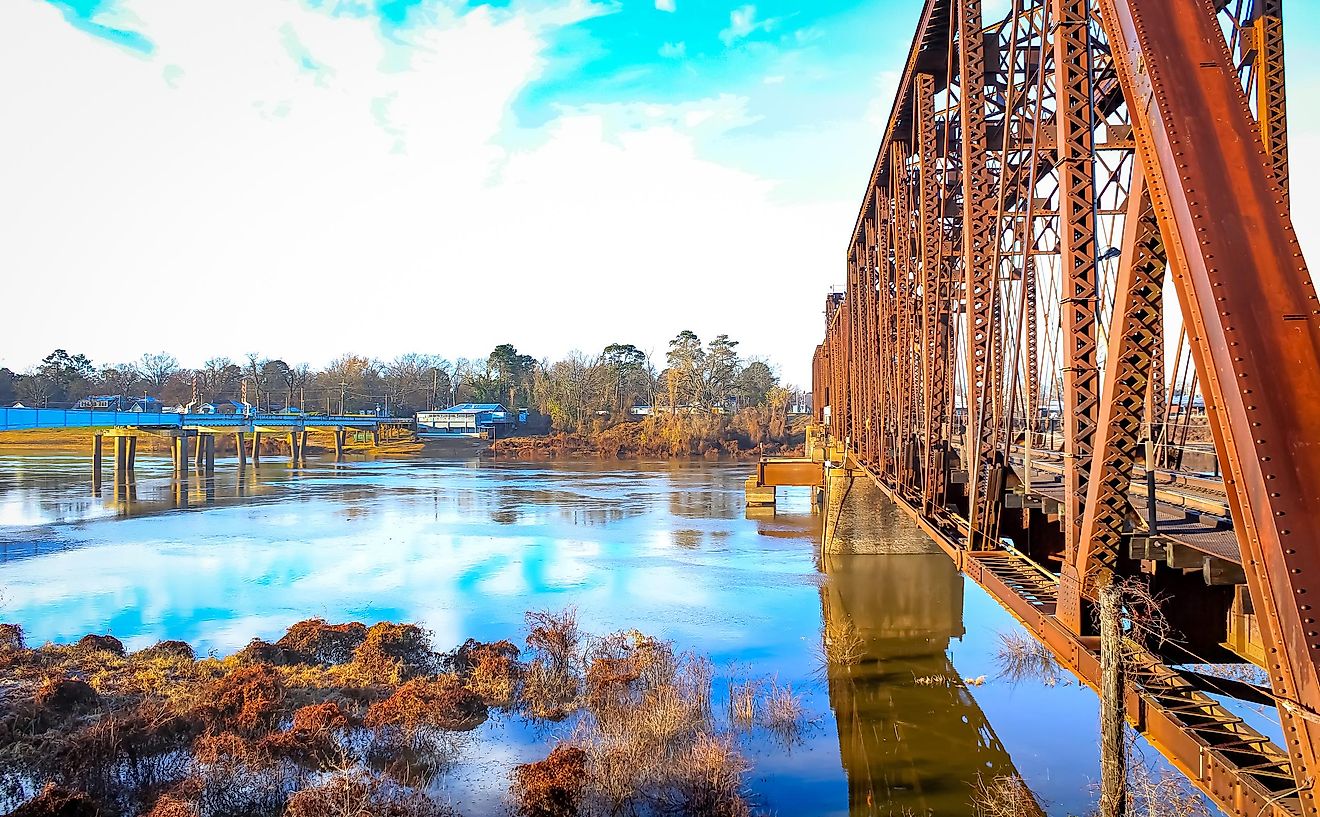 Monroe, Louisiana, rusty railroad bridge spanning the river. Editorial credit: Sabrina Janelle Gordon / Shutterstock.com