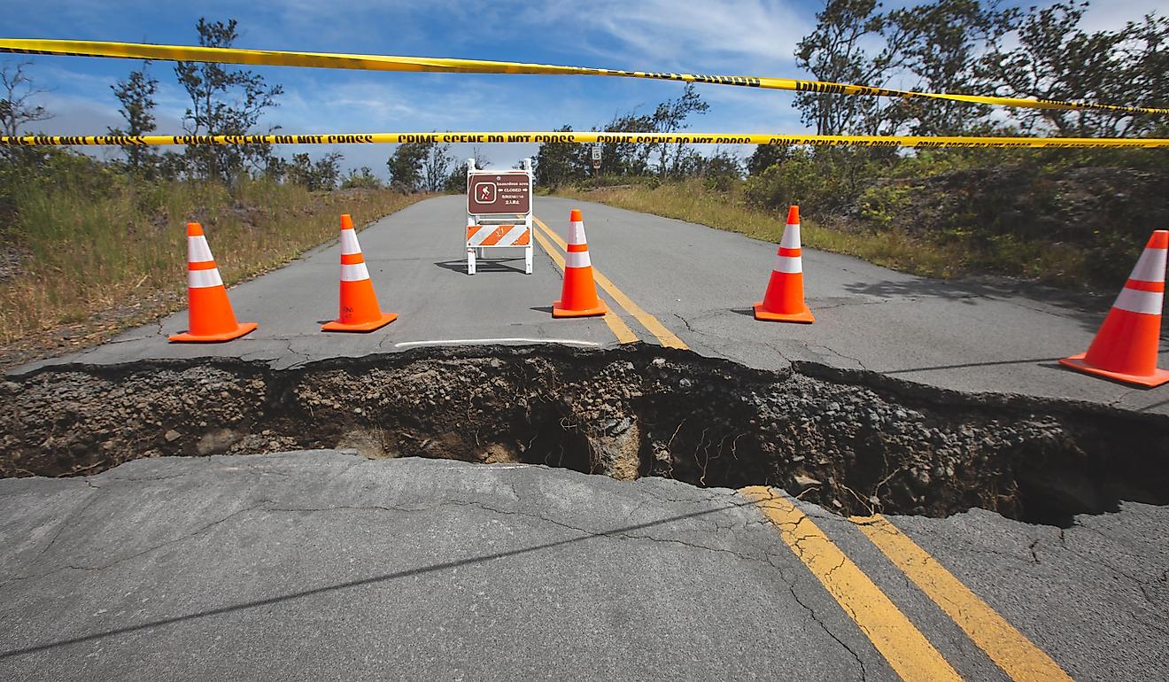 A broken road divided by a large crack from an earthquake 