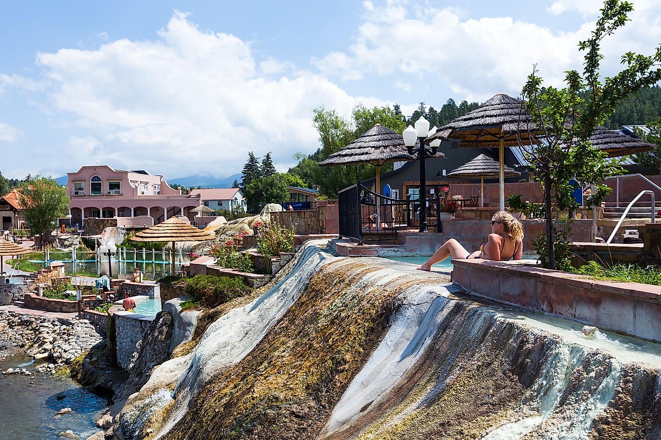 Pagosa Springs, Colorado, USA - August 19th, 2021: People relaxing in popular resort the Springs, San Juan river hot springs