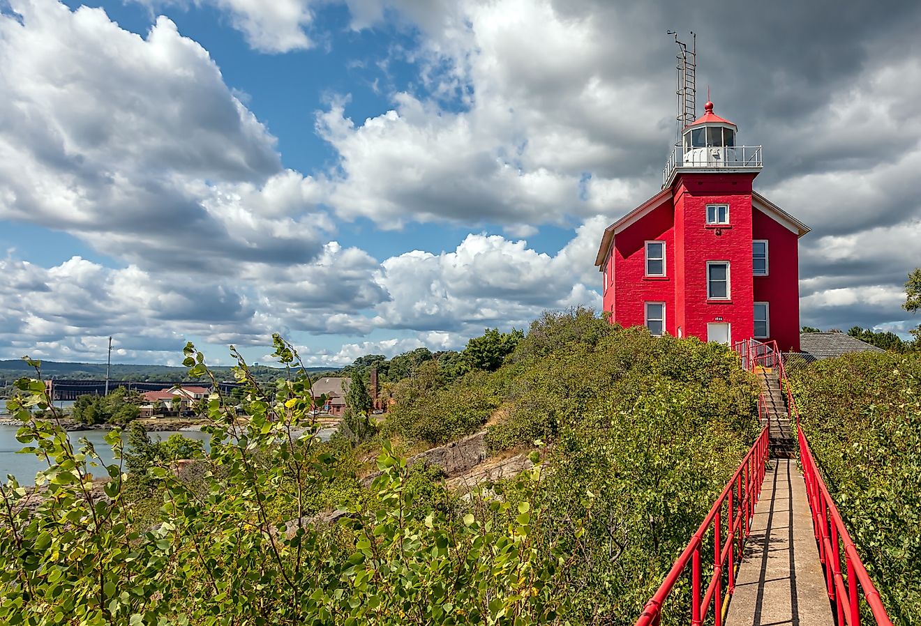 Marquette Harbor Lighthouse, Michigan with catwalk on a sunny summer day.