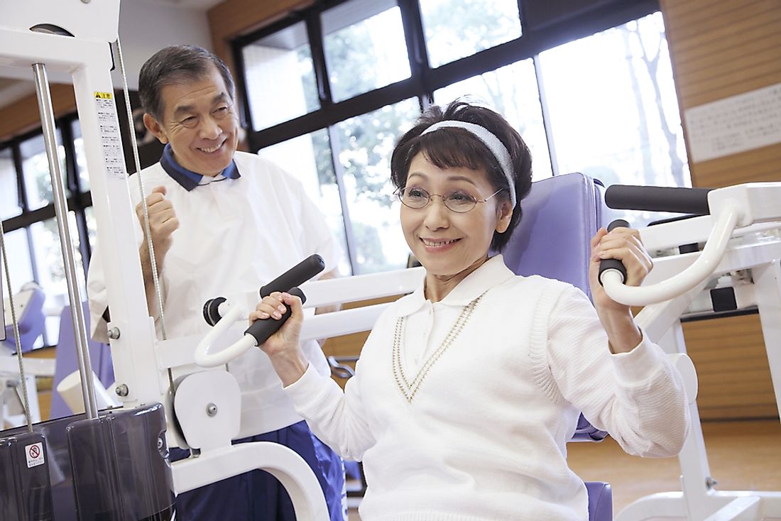 An elderly Japanese couple hitting the weights. Home to many supercentenarians, 26.3% of the island nation's population is 65 years of age or older.