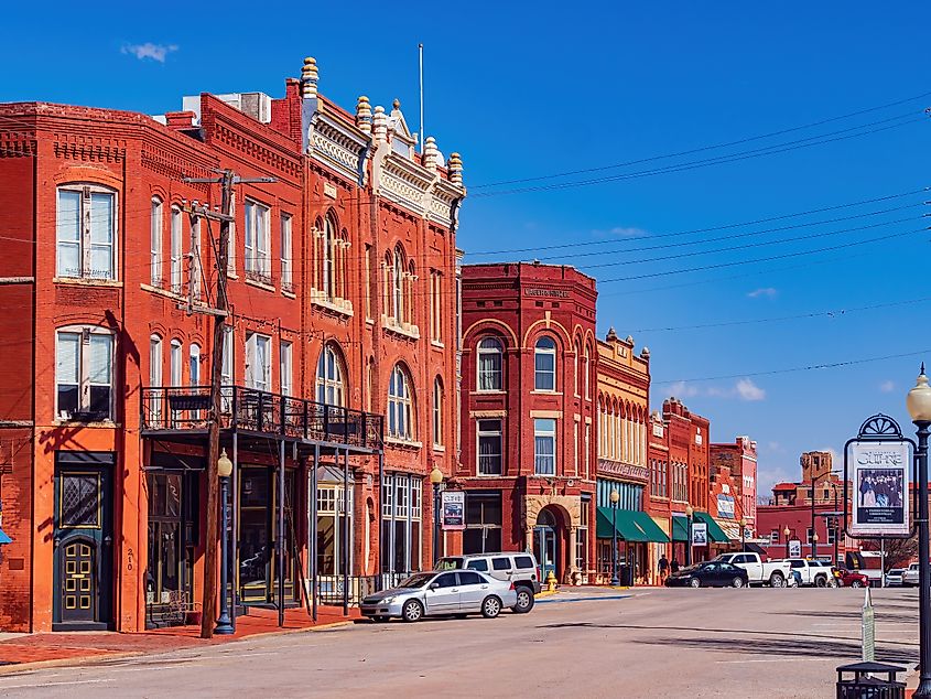 Sunny exterior view of the Guthrie old town. Editorial credit: Kit Leong / Shutterstock.com