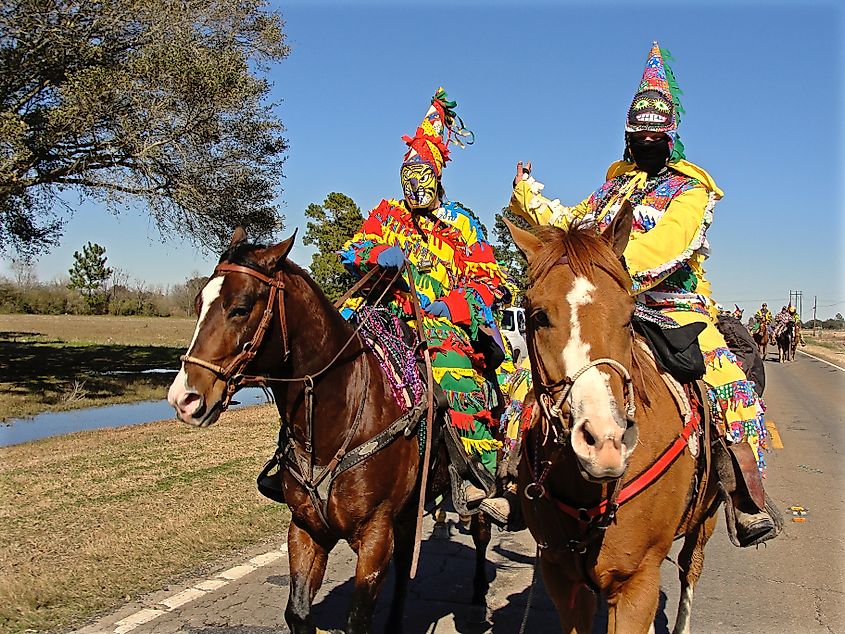 Two Cajun Mardi Gras horseback riders in Eunice, Louisiana.