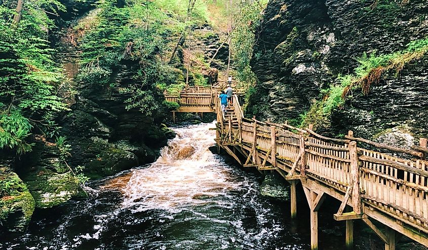 The boardwalk and stairs through Bushkill Falls canyon that located in Northeast Pennsylvania's Pocono Mountains in the United States.