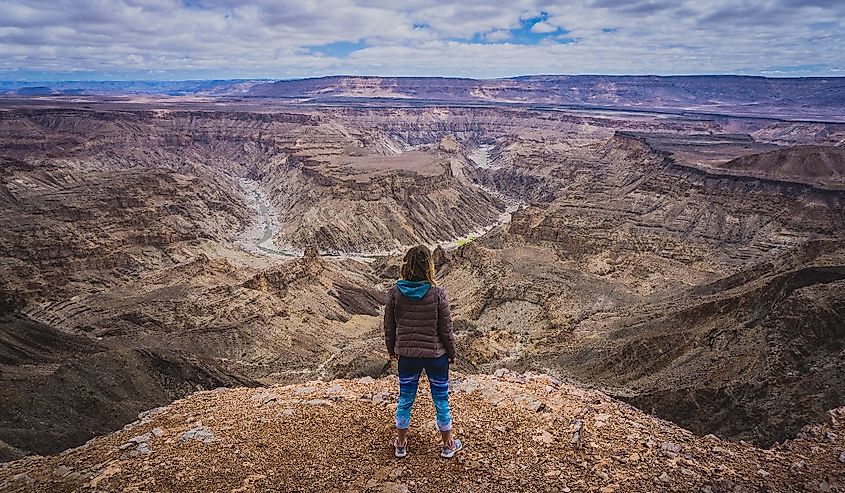 Woman looking over Fish River Canyon. 